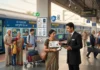 Railway ID Proof List : Valid Documents for Train Travel TTE verifying a passenger's identity document before train travel at an Indian railway station